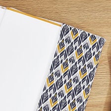 X-Kirjanpäällisen ompelu