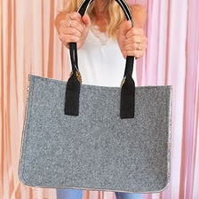 X-Huopakassin ompelu