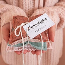 X-Käsienlämmittimien ompelu