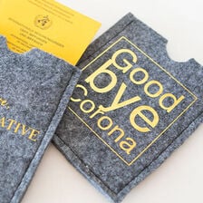 X-Rokotuskortin suojakotelo ommellen