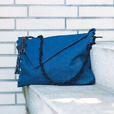 X-Farkkutaskun ompelu