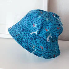 X-Aurinkohatun ompelu